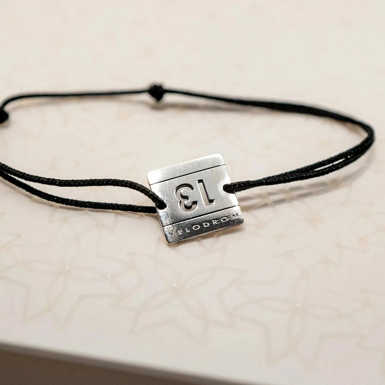 AINA Number 13 - Silver Metal